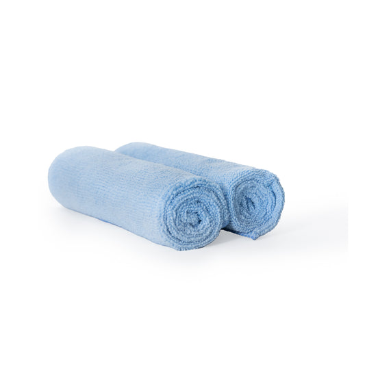 Two rolled-up Poli Glow 320 GSM blue towels on a white background