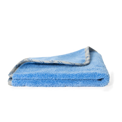 Poli Glow 400 GSM Microfiber Towel Folded with gray border on a white background