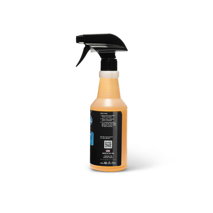 Poli Glow Poli Interior Detailer 16oz Spray bottle with a black nozzle on a white background showing side view with directions.