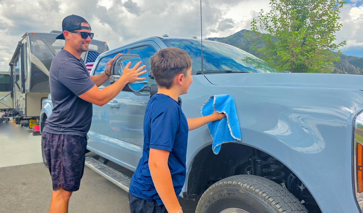 father and son washing a truck with Poli Glow 320 GSM microfiber towels