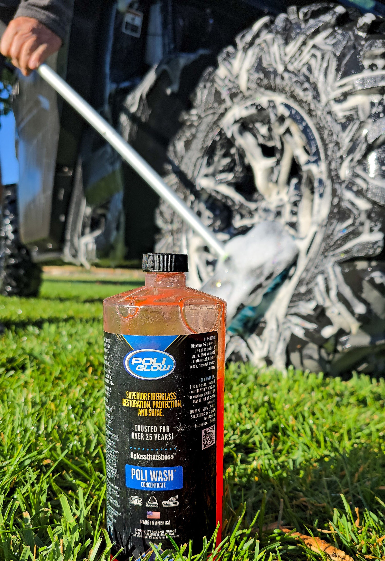 scrubing tires with poli wash concentrate bottle